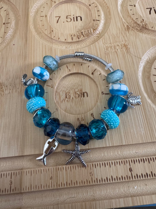 Ocean Breeze Charm Bracelet – Silver Wire Bangle with Blue Beads & Nautical Charms