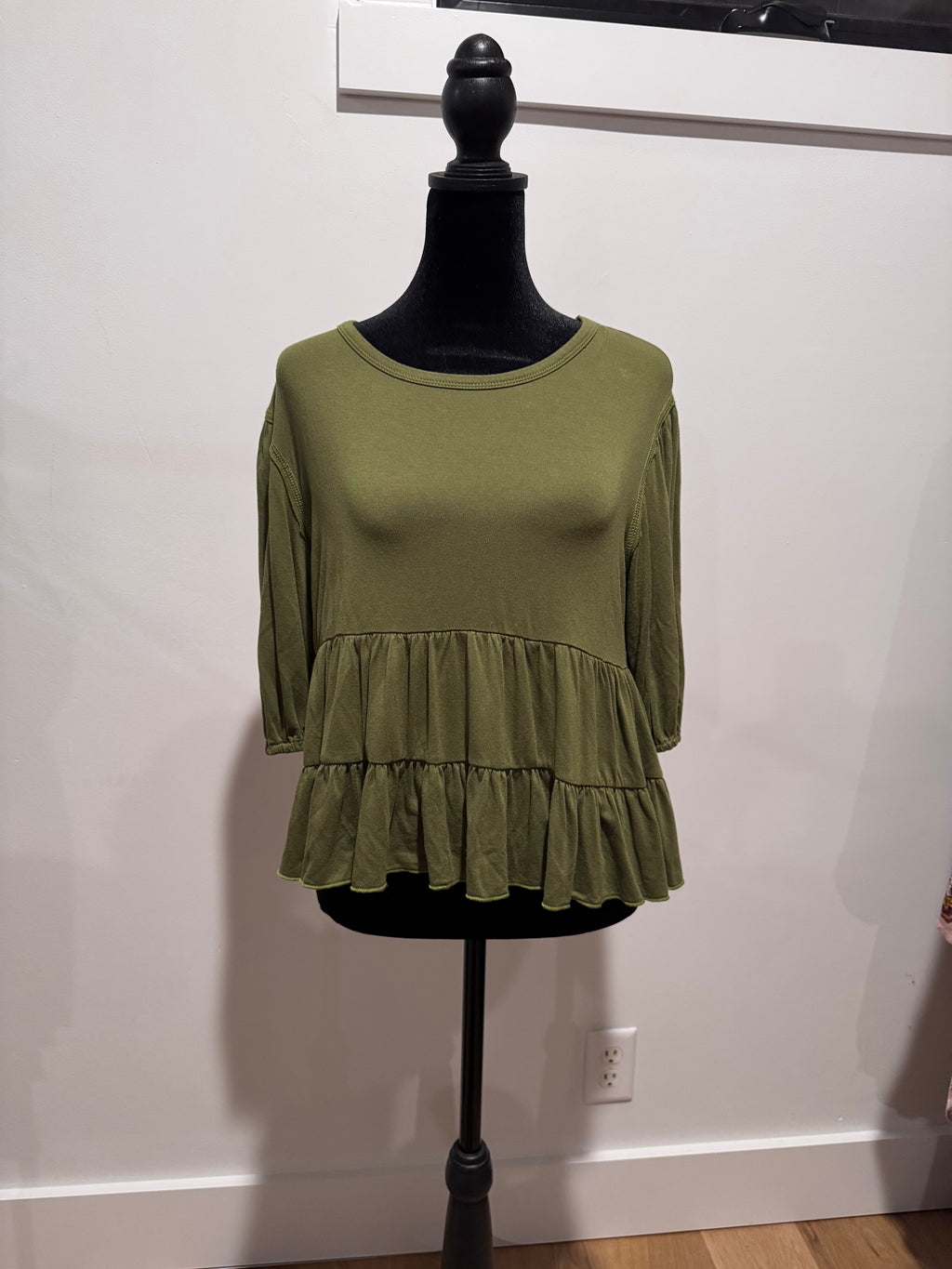 By:Originality- size small green shirt