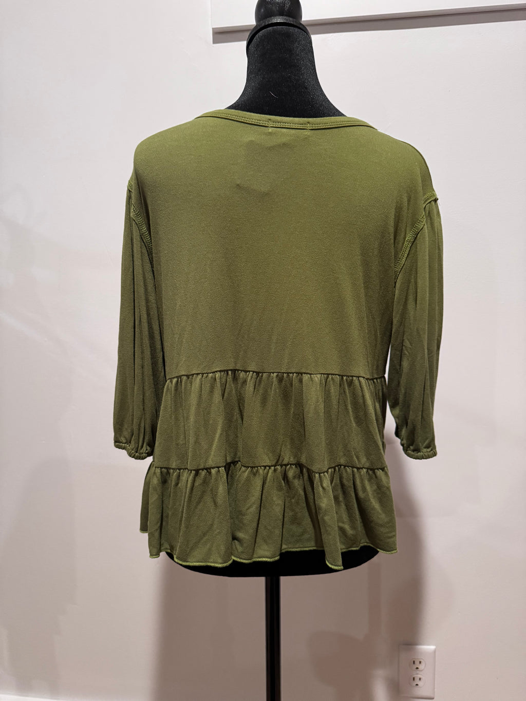 By:Originality- size small green shirt